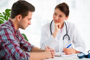 doctor with male patient